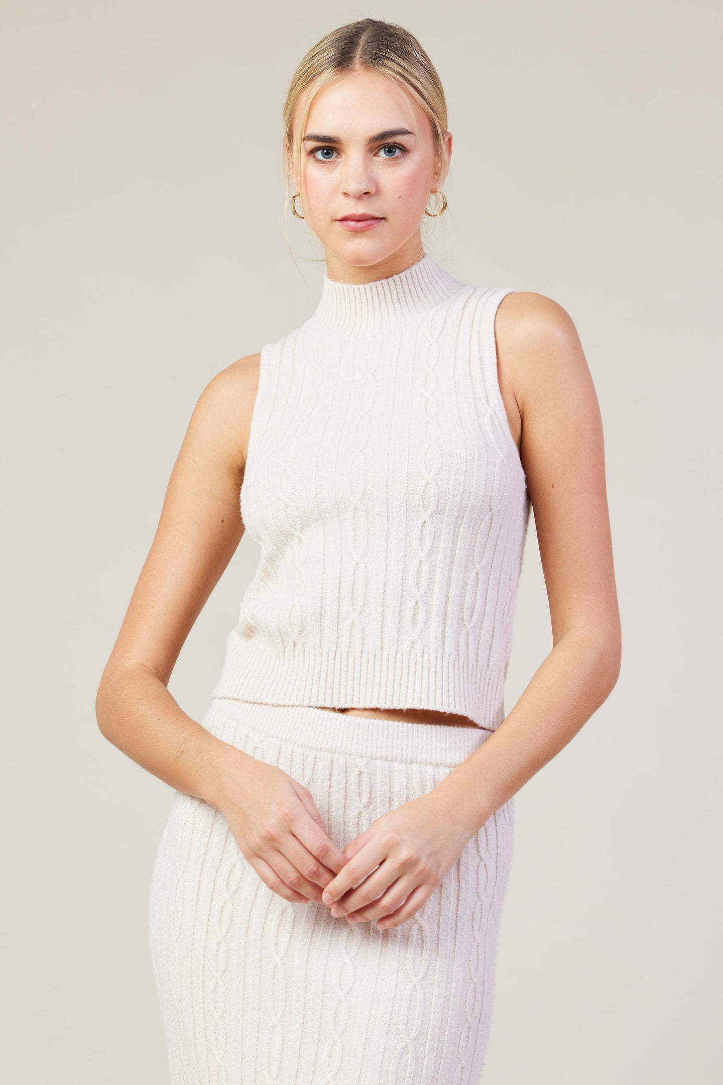 Sleeveless Mock Neck Cable Knit Sweater